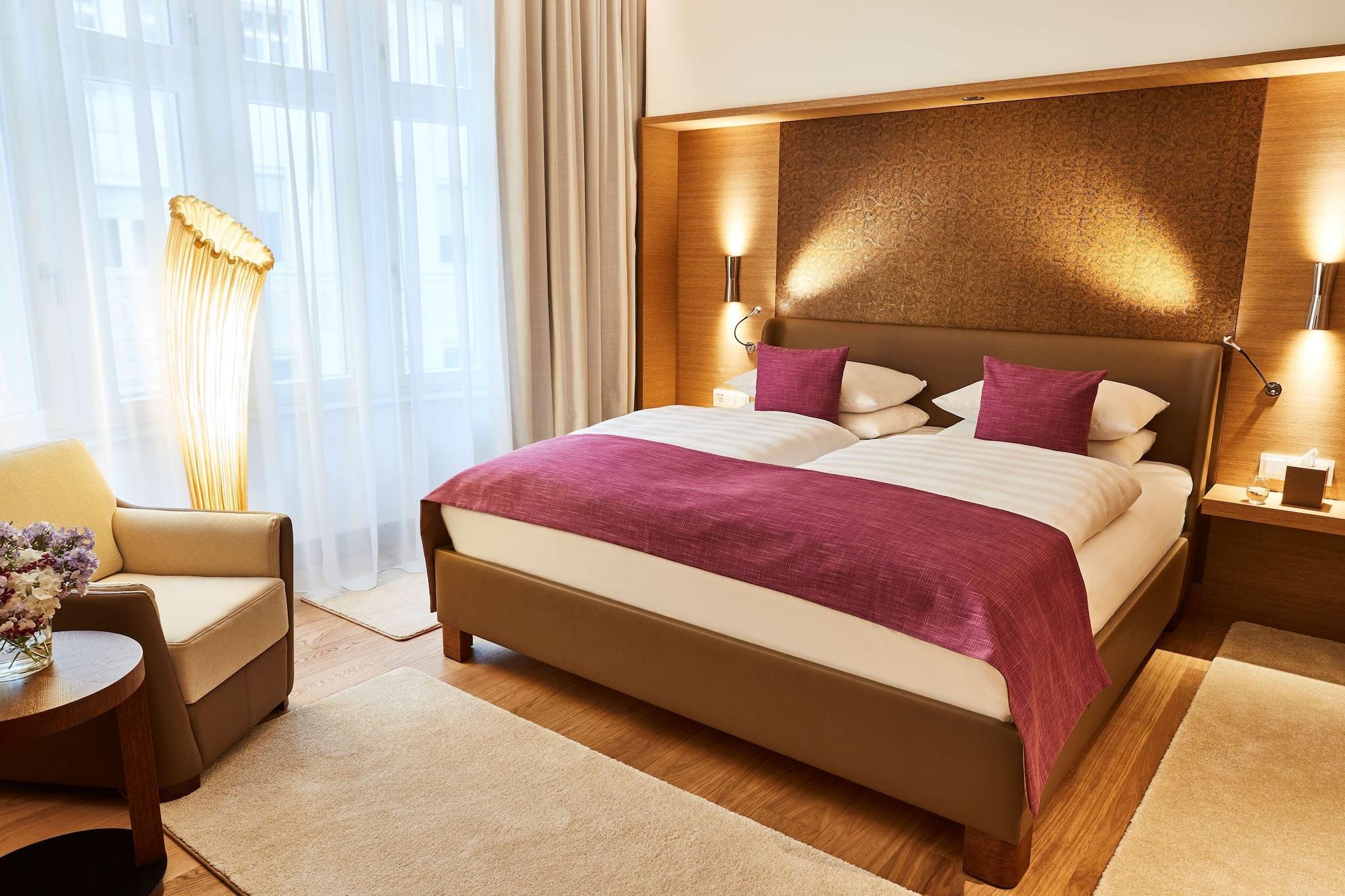 비에 야레스자이텐 켐핀스키 뮌헨 외부 사진 A typical hotel room